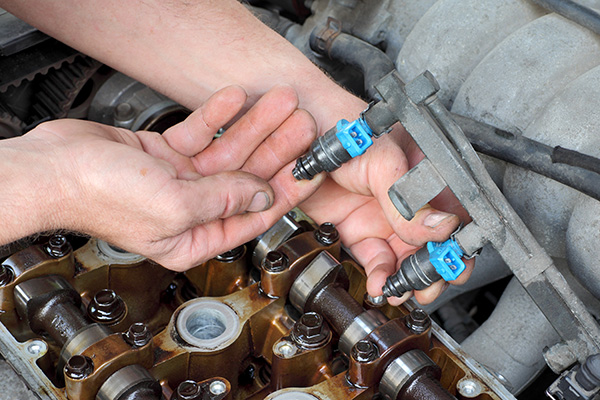 Signs of Clogged Fuel Injectors and How to Fix Them | The Auto Doc